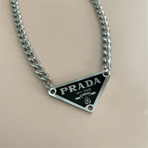 prada necklace logo triangle|Prada necklace triangle dupe.